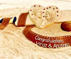 Virat Kohli and Anushka Sharma get a sandy wedding gift!