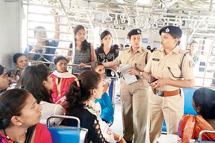 GRP shows women how to use helpline on Mumbai local trains