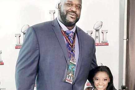 The long and short of it! Simone Biles shares photo with Shaquille O'Neal