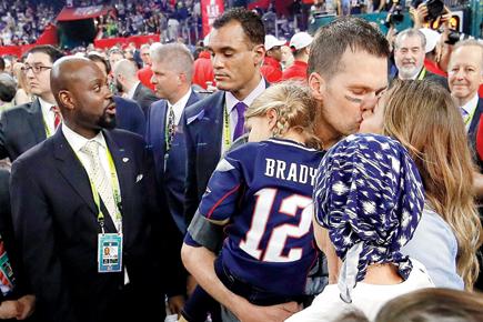 Tom Brady kisses model wife Gisele Bundchen after Super Bowl win