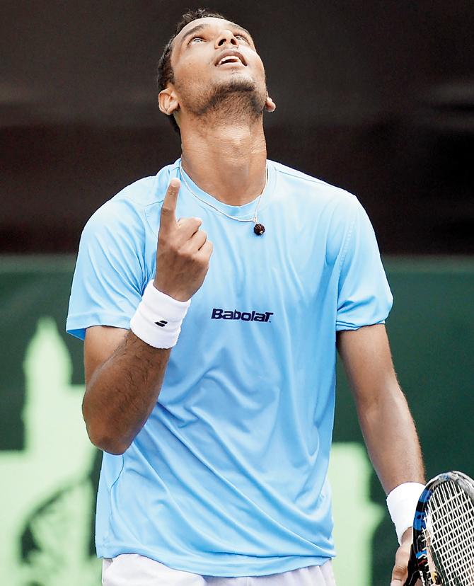 Ramkumar Ramanathan reacts after winning his Davis Cup singles match against New Zealand