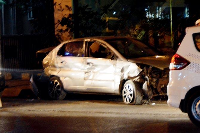 The damaged car outside Bandra police station