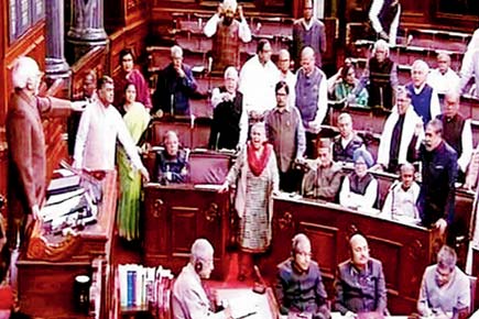 Congress to boycott Narendra Modi in Parliament over 'raincoat' jibe
