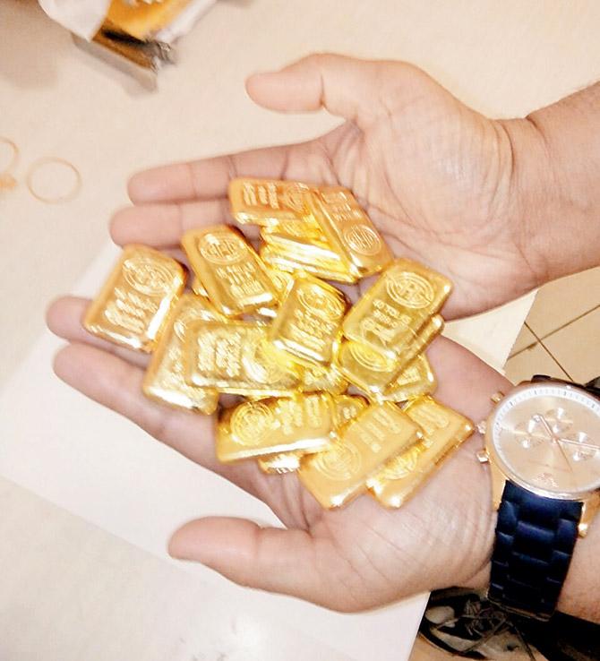Gold bars seized by AIU officials