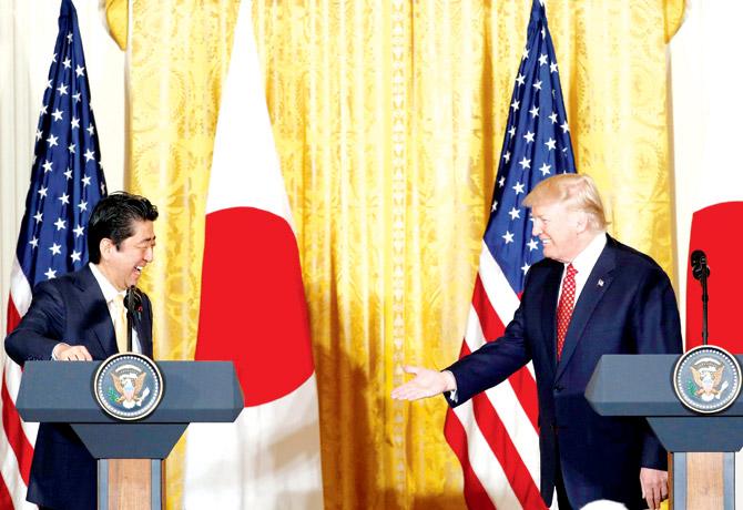 US President Donald Trump and Japanese Prime Minister Shinzo Abe (left) during a news conference. Pic/AFP