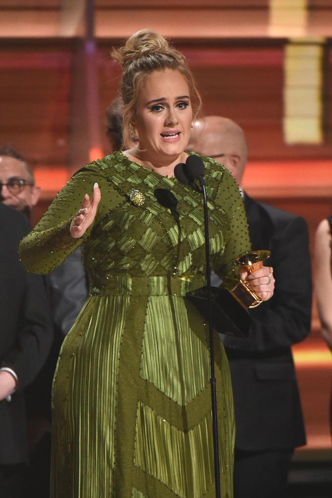 Adele receives awards including Best record and Best album of the year during the 59th Annual Grammy music Awards on February 12, 2017, in Los Angeles, California. Pic/AFP