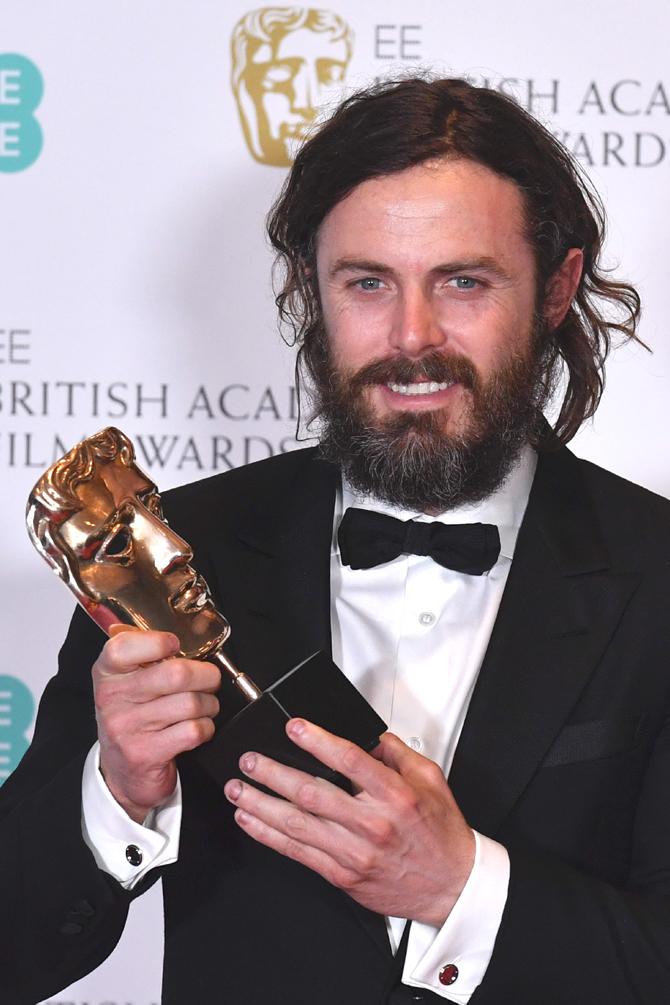 US actor Casey Affleck poses with the award for a Leading Actor for his work on the film 