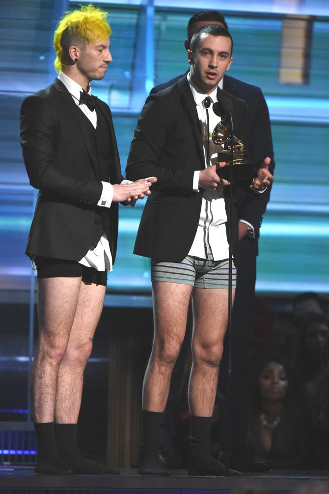 Recording artists Josh Dun (L) and Tyler Joseph of music group Twenty One Pilots accept the Best Pop Duo/Group Performance award for 