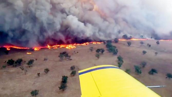 This screen-grab released on February 12 shows a bushfire near Leadville in NSW. Pic/AFP