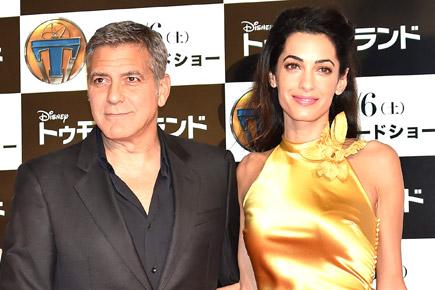 George Clooney and wife Amal casually mentioned baby news to Julie Chen