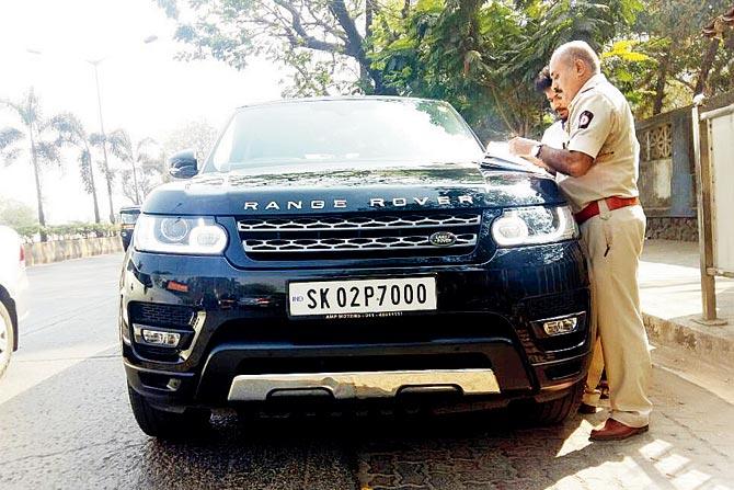 Andheri RTO officials with the car