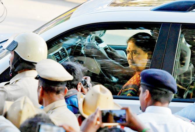VK Sasikala arrives at the special court in Bangalore. She will make candles in jail and be paid Rs 50 per day for this