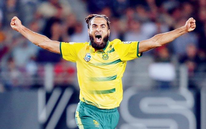 South Africa’s Imran Tahir celebrates a New Zealand wicket during their T20I match at Eden Park in Auckland yesterday. Pic/ AFP