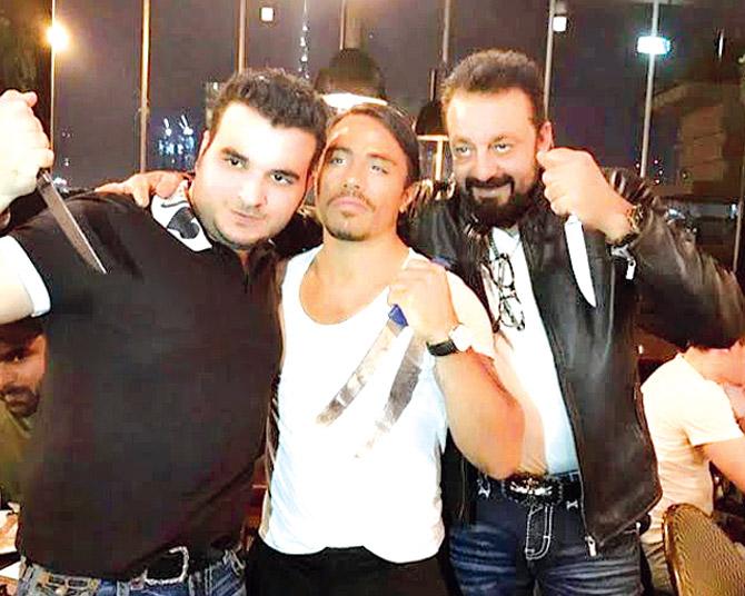 Chef Nusret Gokce (centre) and Sanjay Dutt with a friend