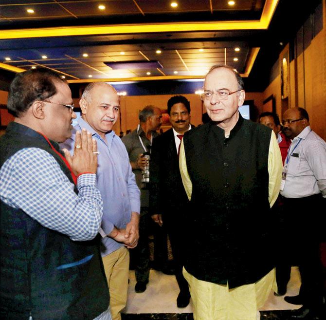 Arun Jaitley with Delhi deputy CM Manish Sisodia during the 10th meeting of GST council at Udaipur on Saturday. Pic/PTI