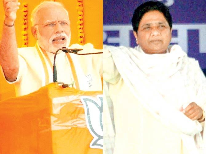 Narendra Modi and Mayawati. Pics/PTI