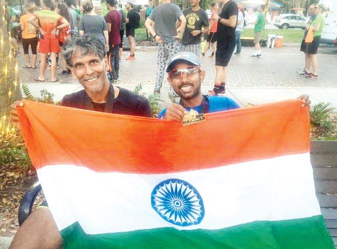 Milind Soman with a fellow Indian participant