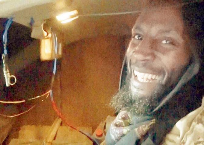 Abu-Zakariya al-Britani photographed on his way to the suicide attack