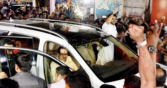 It’s all in the family A roaring crowd of supporters greets Sena chief Uddhav Thackeray as he arrives with son Aaditya at party HQ in Dadar. Meanwhile, cousin Raj’s home wears a deserted look.