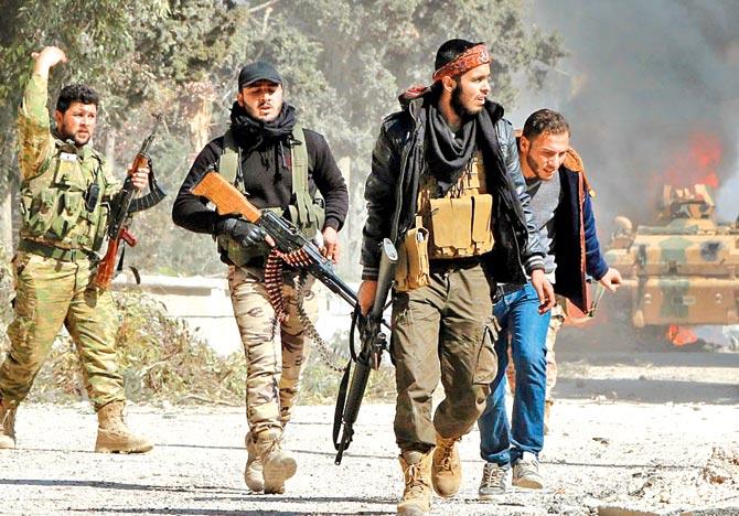Turkey-backed Syrian opposition fighters advance in al-Bab on February 22. Pic/AFP