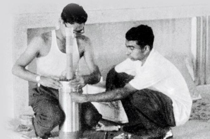 Aravamudan (in vest) and APJ Abdul Kalam preparing a payload inside the church building in Thumba, Kerala (1964)