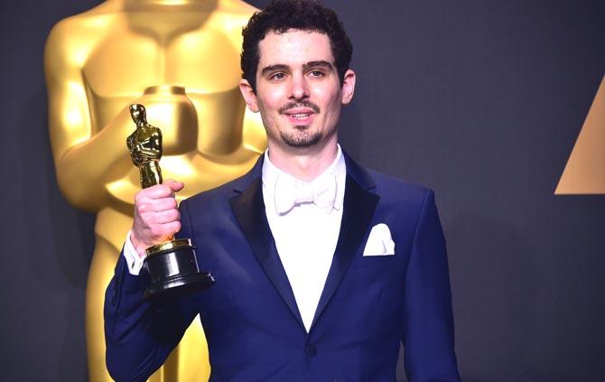 Damien Chazelle poses in the press room with the Oscar for Best Director during the 89th Annual Academy Awards in California. Pic/AFP