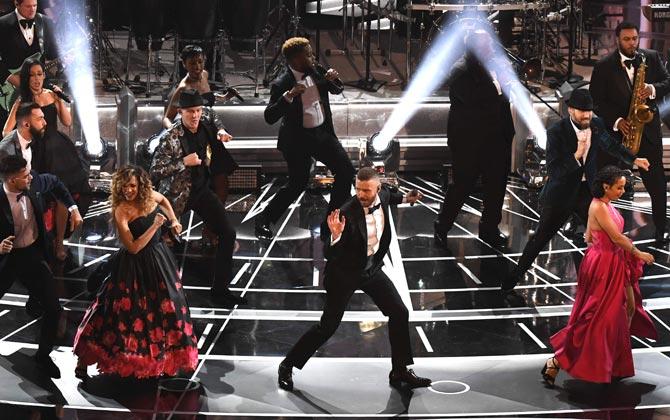 US singer Justin Timberlake (C) performs on stage at the 89th Oscars in California. Pic/AFP