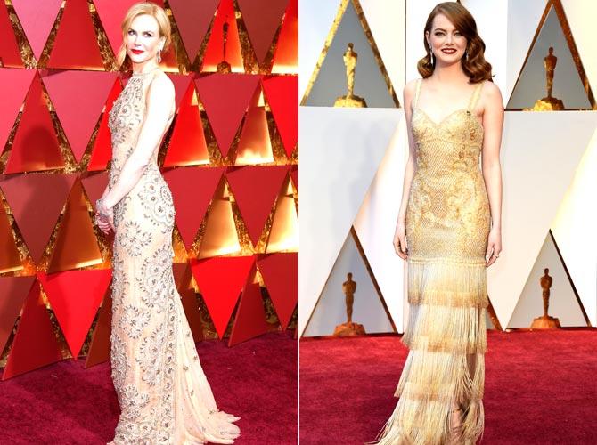 Nicole Kidman and Emma Stone arrives on the red carpet for the 89th Oscars. Pic/AFP