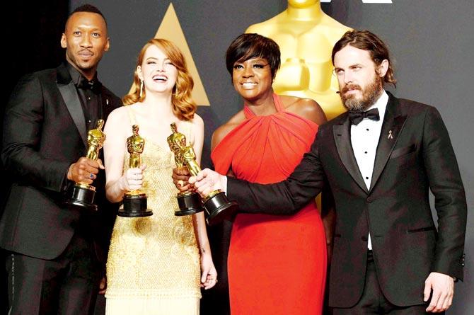 (From left) Mahershala Ali, winner of best actor in a supporting role, Emma Stone, winner of best actress in a leading role, Viola Davis, winner of best actress in a supporting role, and Casey Affleck, winner of best actor in a leading role. Pic/AFP