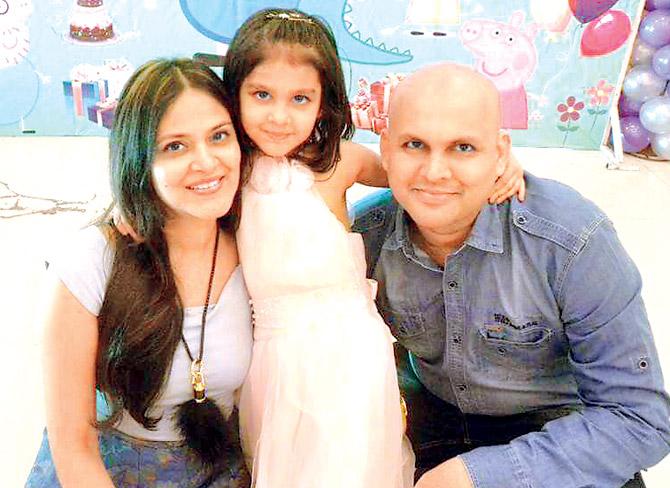 Dhaval Shah along with his wife and daughter 