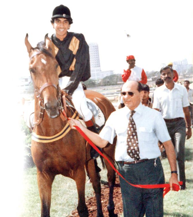 Milan in 1983 on a mare called Lucy, being led in by one of his tutors, the legendary horseman Jimmy Bharucha