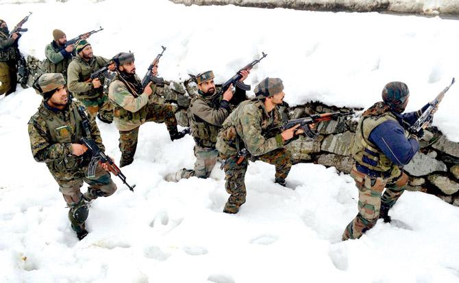 Commandos during the Sopore encounter on Saturday. Pic/PTI