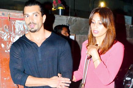 Hands Off! Is Karan Singh Grover urging wife Bipasha Basu to let go of his arm?