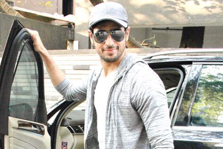 Is Sidharth Malhotra trying to hide his new look?