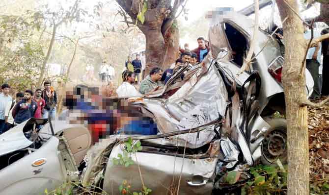 Remains of the car in which the eight, including Abhishek Kambli, were travelling. File pics