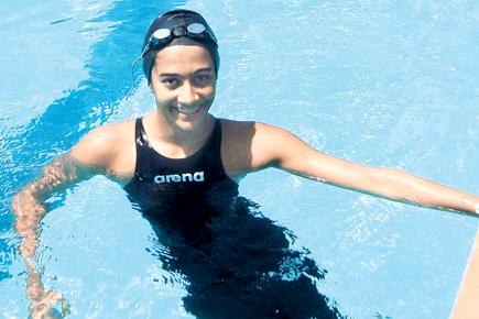 Kenisha sets YMCA pool ablaze with six records