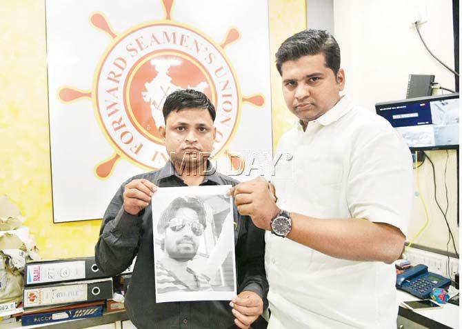 Manjeet Yadav (left), cousin of deceased sailor Amit Yadav, and trade union leader Manoj Yadav are trying to bring the seaman’s body home