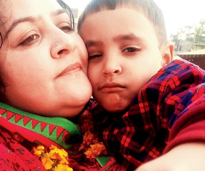 Rohina Kiyani with her son, Iftikhar. Pic/AFP