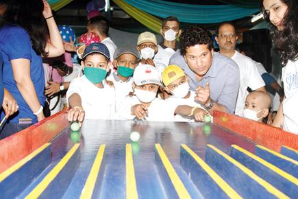Sachin Tendulkar interacts with cancer afflicted kids in Mumbai