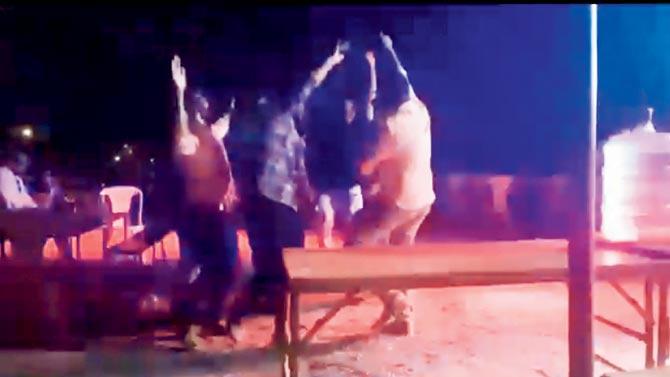Vasai-Virar Municipal Corporation engineers dance at the party thrown by a builder at Vasai beach