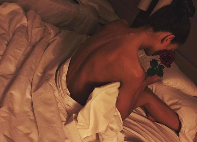 Amy Jackson poses nude in bed