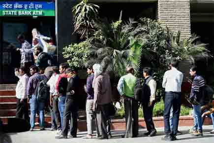 Cash withdrawal weekly limit goes up to Rs 50,000