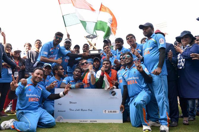 Visually challenged players of the Indian blind cricket team celebrate their victory against Pakistan after winning the 2nd T20 World Cup Cricket for the Blind 2017, in Bangalore. Pic/AFP