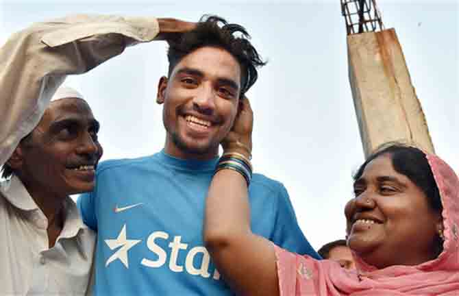 Mohammed Siraj talking to the media at his residence in Hyderabad on Monday. The pace bowler was picked up by Sunrisers Hyderabad for Rs 2.6 crore in the IPL auction. PTI 