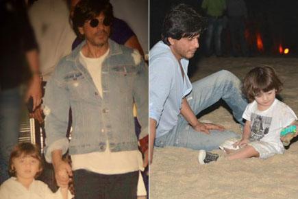 Shah Rukh Khan and AbRam go for stroll on Juhu beach, build castles