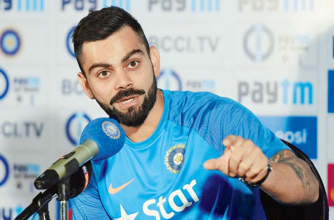 Virat Kohli interacts with media in Pune on Saturday. Pic/PTI