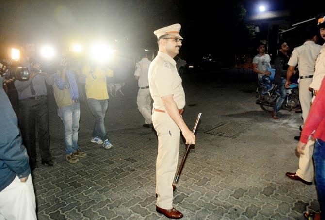 DCP (zone III) Pravin Padwal at the spot outside Gate No. 1 of Mahalaxmi Racecourse (below) where the alleged attack took place. PICS/BIPIN KOKATE