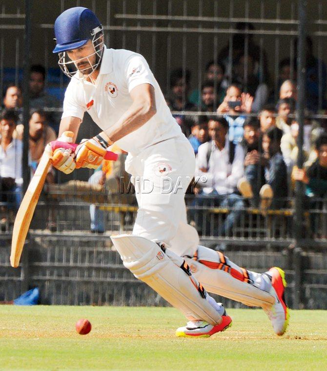 Gujarat’s Manprit Juneja’s (above) bat breaks during Day Two of the Ranji Trophy final against Mumbai at Indore yesterday. Pic/Prakash Parsekar
