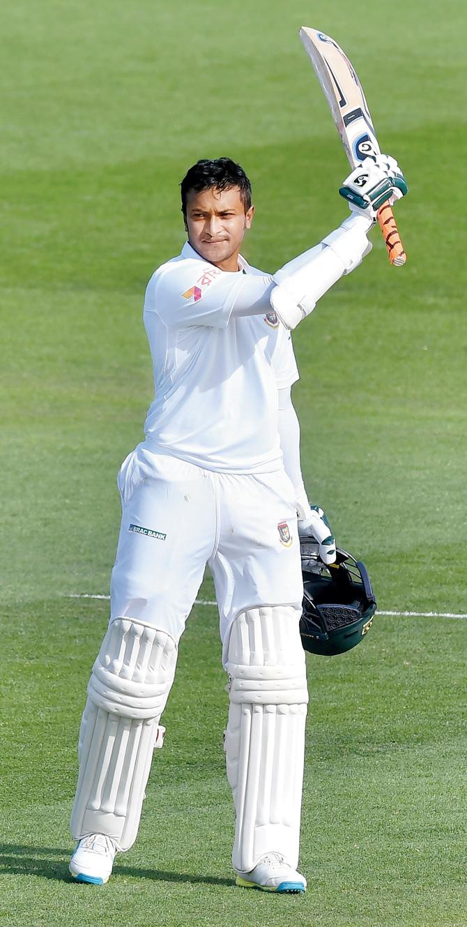 Shakib Al Hasan celebrates his 200 against New Zealand yesterday. Pic/AFP