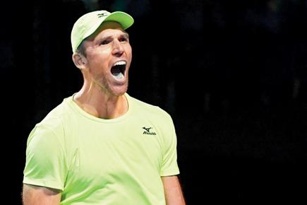 Australian Open: Ivo Karlovic wins after 75 aces and 84 games